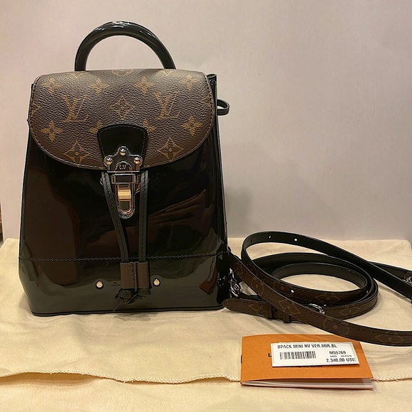 Louis Vuitton hot springs backpack in black vernis and brown monogram. - Picture 1 of 8